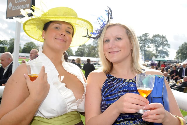 (l-r) Hayley Ridley and Amy Walker both of Auckley at Doncaster St Leger Ladies Day. Picture: Andrew Roe