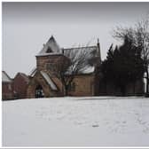 St Oswald's Church in Kirk Sandall - blanketed by snow.