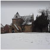 St Oswald's Church in Kirk Sandall - blanketed by snow.