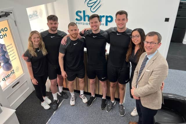 Joe (second from left) with his wife Lucy (far left), staff members at the new Bawtry clinic and Don Valley MP Nick Fletcher.