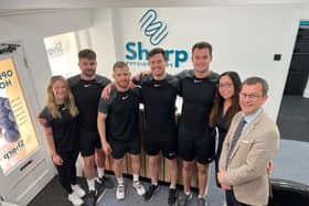 Joe (second from left) with his wife Lucy (far left), staff members at the new Bawtry clinic and Don Valley MP Nick Fletcher.