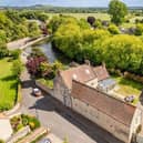 An overview of the property in its stunning waterside location, with Tickhill's shops and other facilities within easy walking distance.