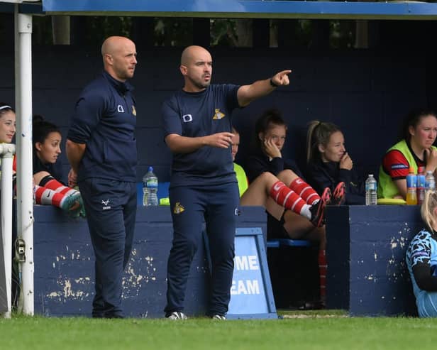 Former Belles manager Sam Winch (left) and his assistant Alexandre Brito Nogueira.