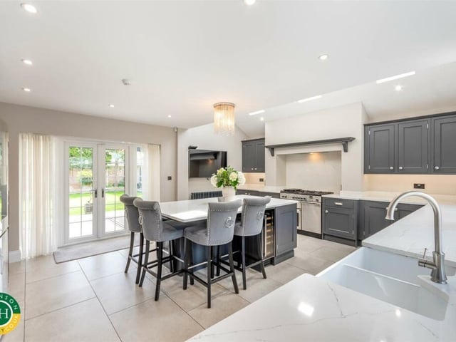 The sleek and stylish breakfast kitchen, with access to outdoors.