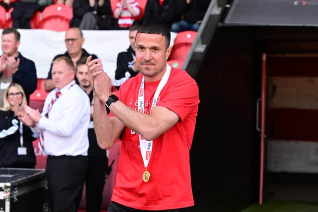 Wood, pictured at the champions celebration event at the Eco-Power Stadium.
