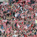 Doncaster Rovers fans celebrate victory over Leeds United in the League One play-off final at Wembley