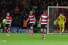 Rovers' players show their dejection after conceding the third goal. Picture: Andrew Roe/AHPIX LTD