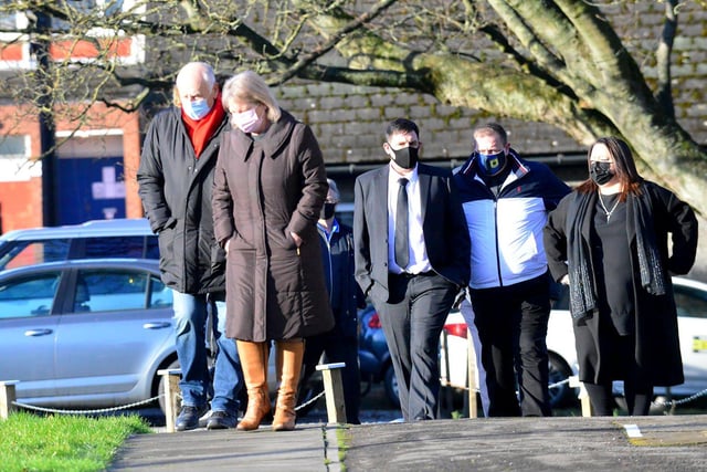 Mourners arrive for the funeral of Eddie Oyston.
