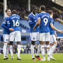 Dominic Calvert-Lewin of Everton celebrates scoring his side's first goal from the penalty spot with team-mate Amadou Onana during the pre-season friendly match between Everton and Sporting Lisbon at Goodison Park on August 5, 2023 in Liverpool, England. (Photo by Jess Hornby/Getty Images)