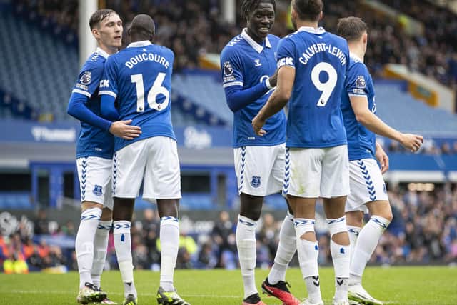 Dominic Calvert-Lewin of Everton celebrates scoring his side's first goal from the penalty spot with team-mate Amadou Onana during the pre-season friendly match between Everton and Sporting Lisbon at Goodison Park on August 5, 2023 in Liverpool, England. (Photo by Jess Hornby/Getty Images)