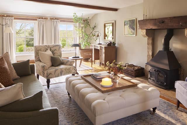 A cosy sitting room within the farmhouse, with lovely views.