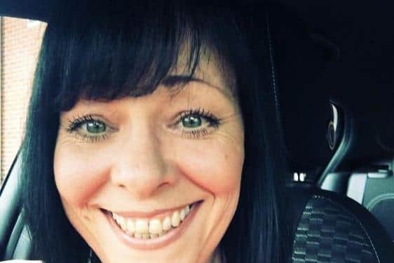 Police have named the woman who died at a house in Sprotbrough as 53-year-old Kelli Bothwell.