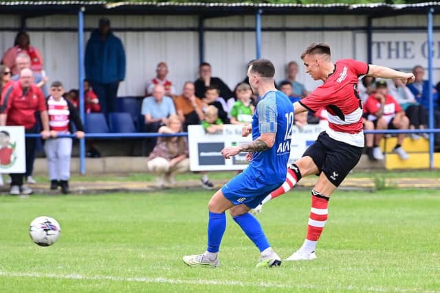 George Broadbent slots home Rovers' second goal. Picture: Howard Roe/AHPIX LTD