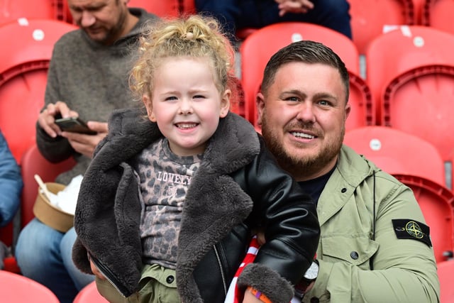 Doncaster Rovers confirmed promotion to League One with a 2-1 victory over Bradford City.
