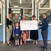 Tornedale Infant School receiving their cheque from Tesco