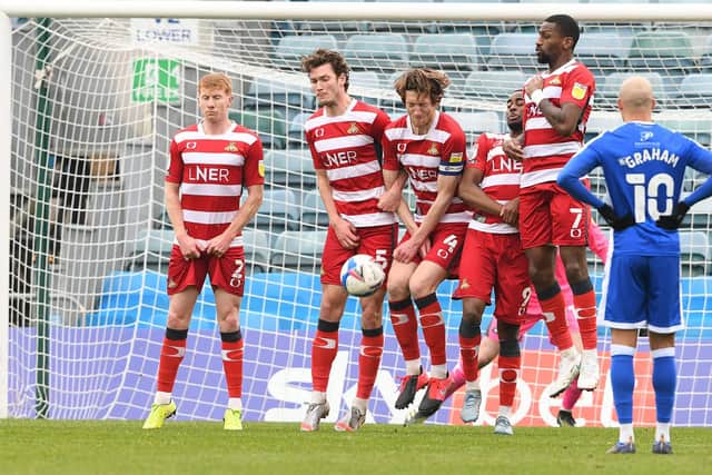 Rovers block a free kick from Gillingham. Picture: Howard Roe/AHPIX
