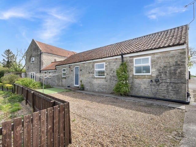 The property has a lovely three-bedroom annexe, with open views.