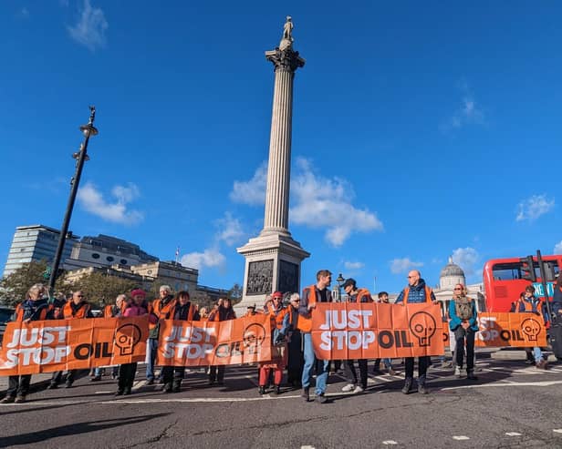 Just Stop Oil protestors in Trafalgar Square.
