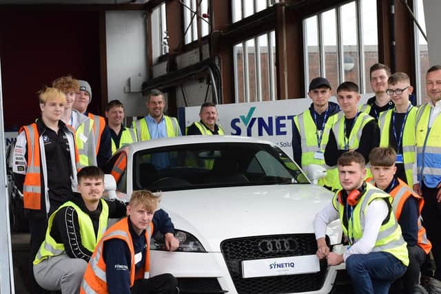 SYNETIQ apprentices alongside (back row from left to right) Trevor Madden, Operations Manager, Michael Hill Head of Operations, Robert Hampson, Operations Manager and Nick Penton, Operations Manager (front right)