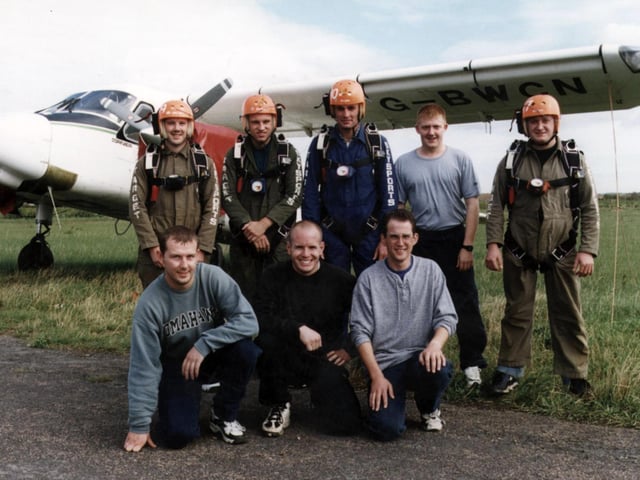 Employees from the Doncaster based Miller Brothers electrical store are pictured just before their charity parachute jump on Sunday, September 18, 1997