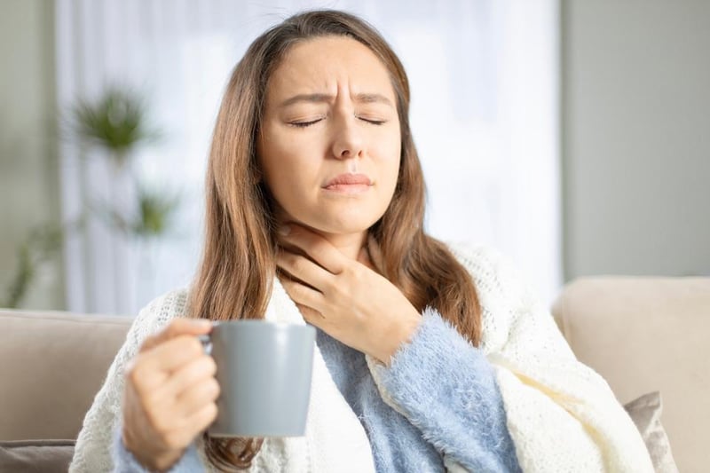 A sore throat is a common symptom of a cold, but can also be caused by a coronavirus infection. It will usually get better on its own within a week and drinking plenty of fluids can help to ease the pain.