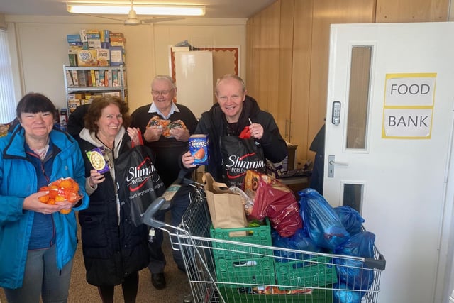 Mexborough Foodbank volunteers, Gail Varley, Bev Hunt, Chaz Prouten and Steve Hunt loading up for food parcel deliveries last Friday.