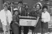 Colleagues and officials gather to embed the time capsule on the construction site of the operating theatres at Montagu Hospital in 1987.