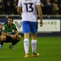 A dejected Tommy Rowe after the final whistle.