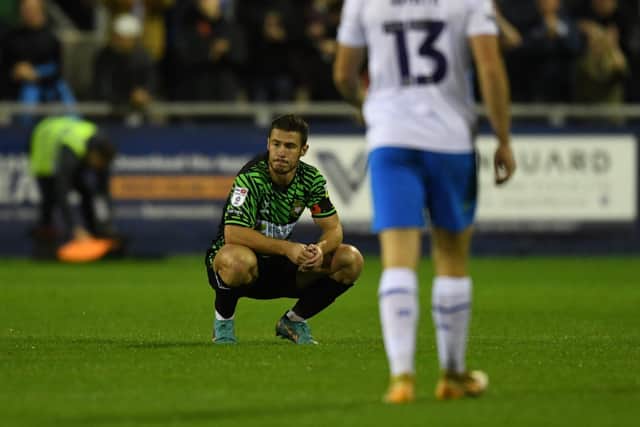 A dejected Tommy Rowe after the final whistle.