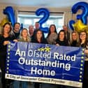 Cromwell Children's Home team celebrate their third 'Outstanding' in a row.
