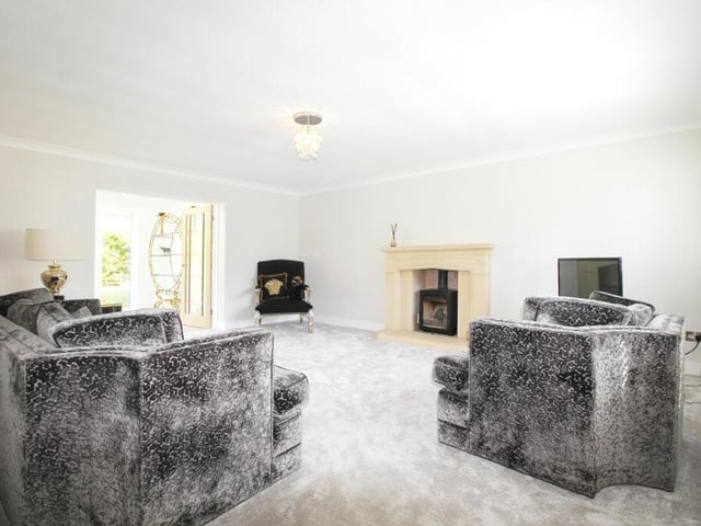 A light and airy lounge with central feature fireplace.