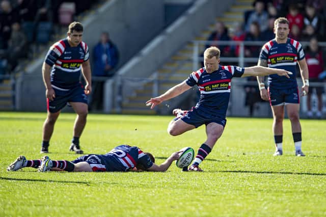 Doncaster Knights Alex Dolly kicks a penalty (Picture: Tony Johnson)
