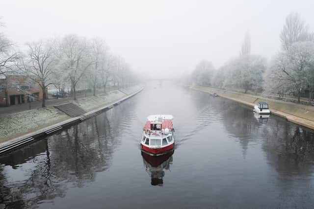 A pleasure boat cruises down the river (Photo by Ian Forsyth/Getty Images)