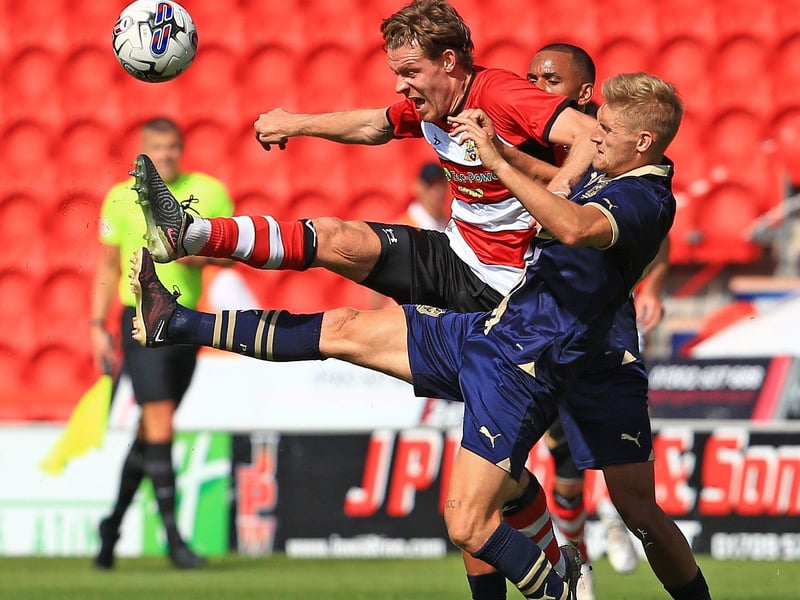 This photo illustrates what Ironside is about. And boy did Doncaster need some physicality at the top end of the pitch. He'll be a big player for the team this season, no doubt. George Miller offers something different, would be interesting to see the pair together at some stage...