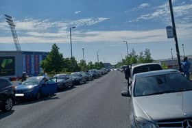 Cars parked illegally outside the Eco Power Stadium.