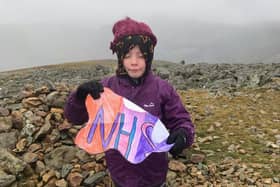 Chloe Smith on the 950-metre-high summit of Helvellyn in the Lake District.