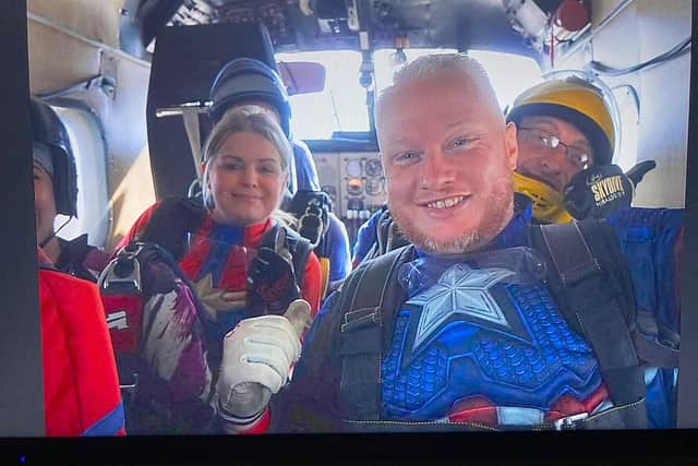 Roger Clark 39 and Bec Eager 38 of Wheatly did the Jessops Superhero Skydive dressed as Captain Marvel and Captain America.