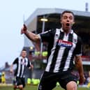 Ross Hannah celebrates scoring a goal during his Grimsby Town days (photo by Matthew Lewis/Getty Images).