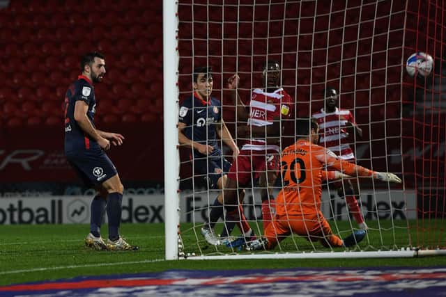 Fejiri Okenabirhie hooks home the equaliser against Sunderland. Picture: Howard Roe/AHPIX