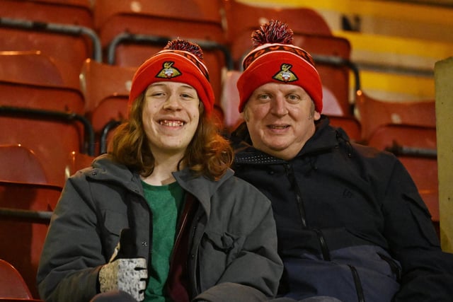 Doncaster Rovers fans watch their side's battling draw at Bradford.