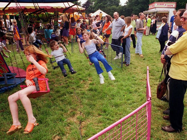 Visitors enjoying the rides at Cusworth Carnival... 13 June 1999