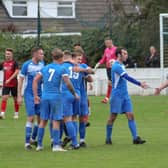 Armthorpe Welfare celebrate one of their six goals against Ollerton Town. Photo: Steve Pennock