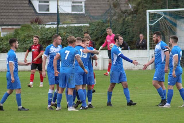 Armthorpe Welfare celebrate one of their six goals against Ollerton Town. Photo: Steve Pennock