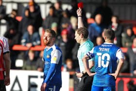 Adam Clayton receives his marching orders from referee Peter Wright. Picture:Gareth Williams/AHPIX LTD