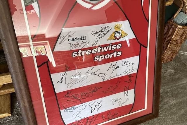 A signed and framed shirt has sold for £500, Ryan said.
