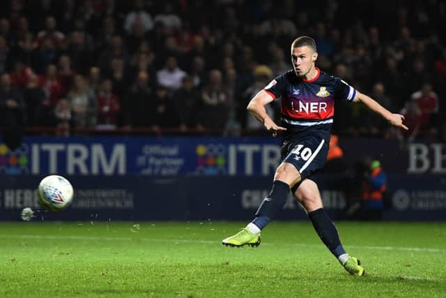 Tommy Rowe fires wide from the penalty spot to end Rovers' play-off campaign