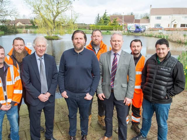 Councillors and members of the Quickline fibre team at Westwoodside Pond.
