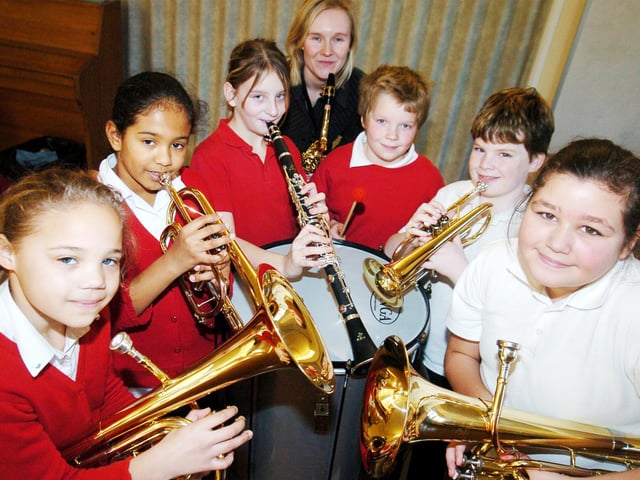 Year five Pupils at Bentley High street primary school are one of six schools in Doncaster which took part in a new government initiative to learn a musical instrument back in 2007. Pictured with their instruments are l-r Roschelle Vose, nine, Tenor Horn, Tori Williams, nine, Cornet, Bethany Hall, nine, Clarinet, School music co-ordinator Elizabeth Barton, who teaches Saxophone and Clarinet, Taylor Cassady, ten, Bass drum, Josh Mair, ten, Cornet, and Yasmin Lanouar, nine, Baratone.