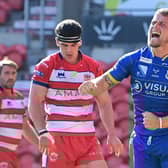 Connor Robinson celebrates his try against Oldham. Picture: Howard Roe/AHPIX.com