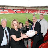 Ray Green, Doncaster Rugby League Club, Lorna Reeve, Visit Doncaster, Marie Hepburn, Club Doncaster, Stewart Piper, Doncaster Rugby League Club president, Chris Dungworth, Business Doncaster and Ben Lewis, Club Doncaster, pictured celebrating after the borough was chosen as a host venue at the Keepmoat Stadium. Picture: Marie Caley/Doncaster Free Press